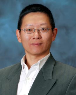 Portrait of Feiyi Wang